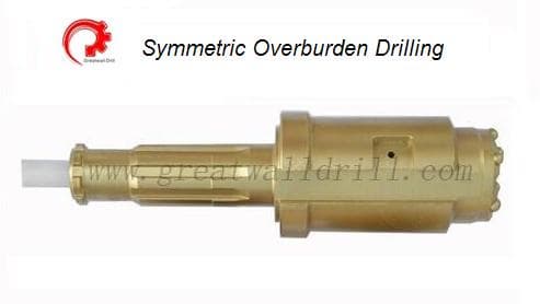 Symmetric overburden drilling tools